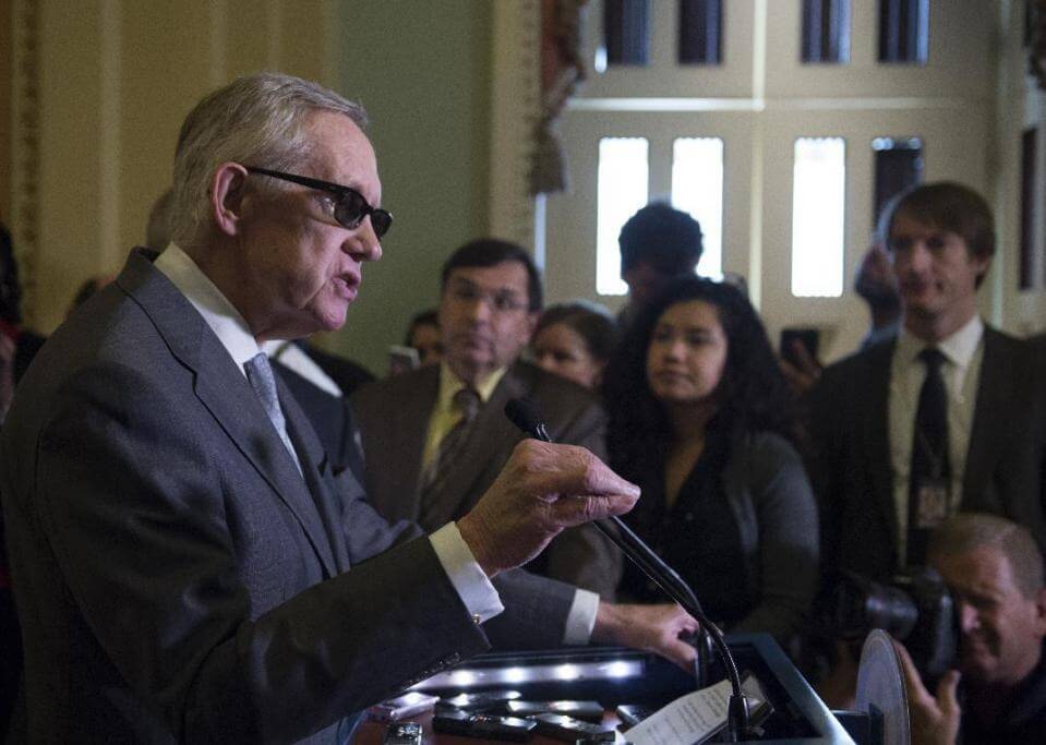 Senate Minority Leader Sen. Harry Reid of Nev. speaks at a news conference on Capitol Hill in Washington, Tuesday, June 9, 2015, following a Senate policy luncheon. (AP Photo/Molly Riley) 