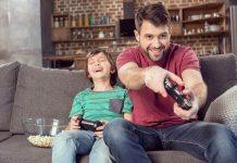 father-son-playing-video-game