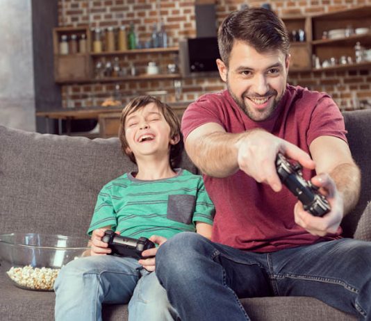 father-son-playing-video-game