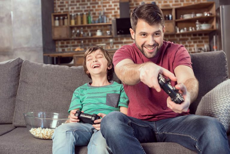 father-son-playing-video-game